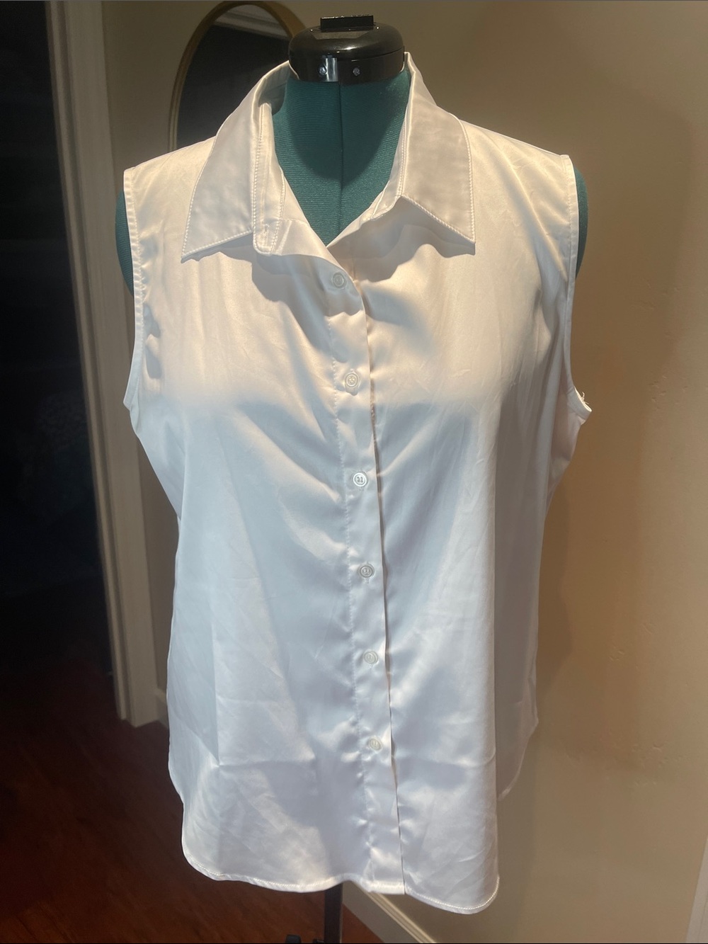 Sleeveless White Button-Down Shirt
